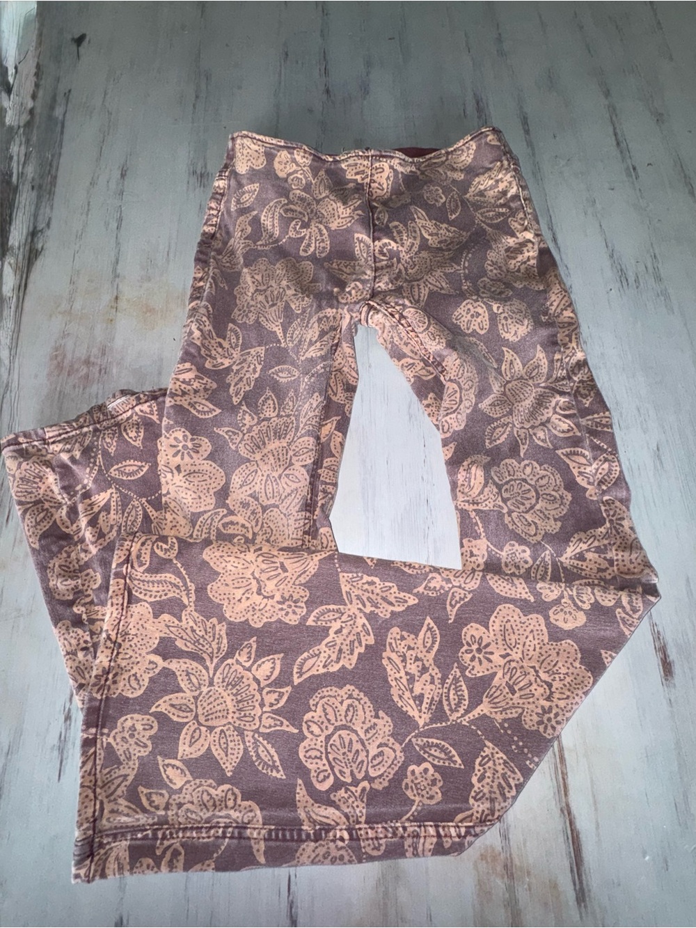 We The Free Floral Wide Leg Jeans in Beige on Taupe